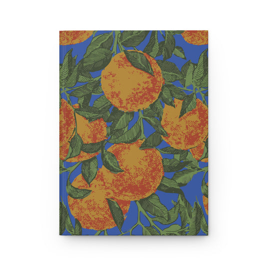Front cover of Orange Grove journal with illustrated oranges and green leaves on a blue background.