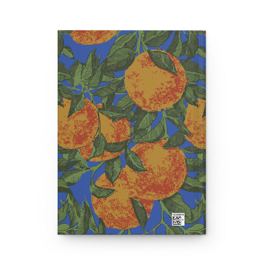 Back cover of Orange Grove journal with an orange and green leaf pattern on blue.