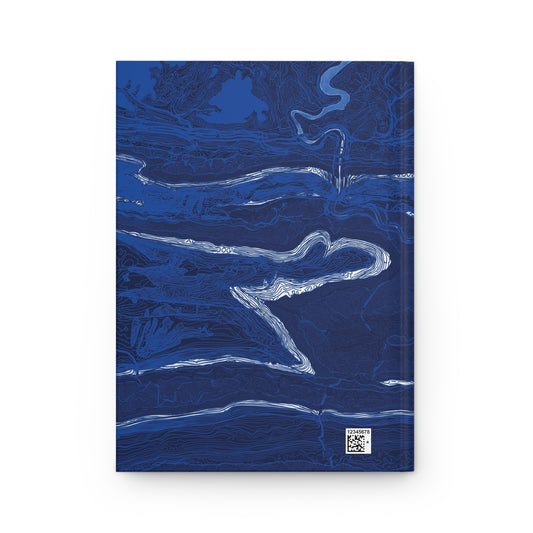 Back cover of The Fall Line journal with winding white and pale blue lines on a dark blue background.